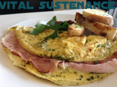 ham and egg omelette with pesto and tomato chutney bread side