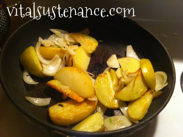 potatoes and onions on fry pan