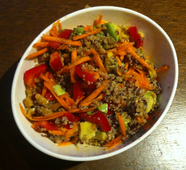 quinoa, avocado, carrot, capsicum salad with nuts and asian dressing