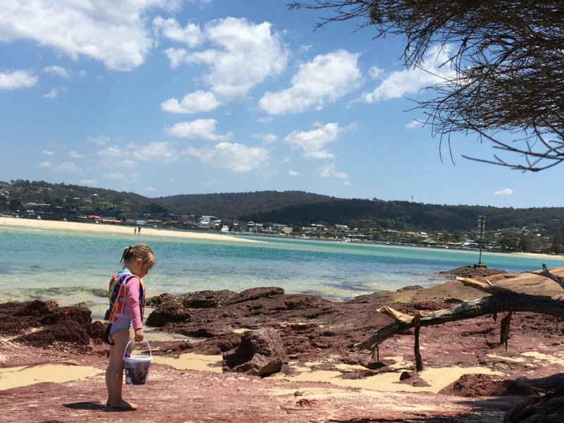 what makes you happy? Girl on rocks at Bar Beach