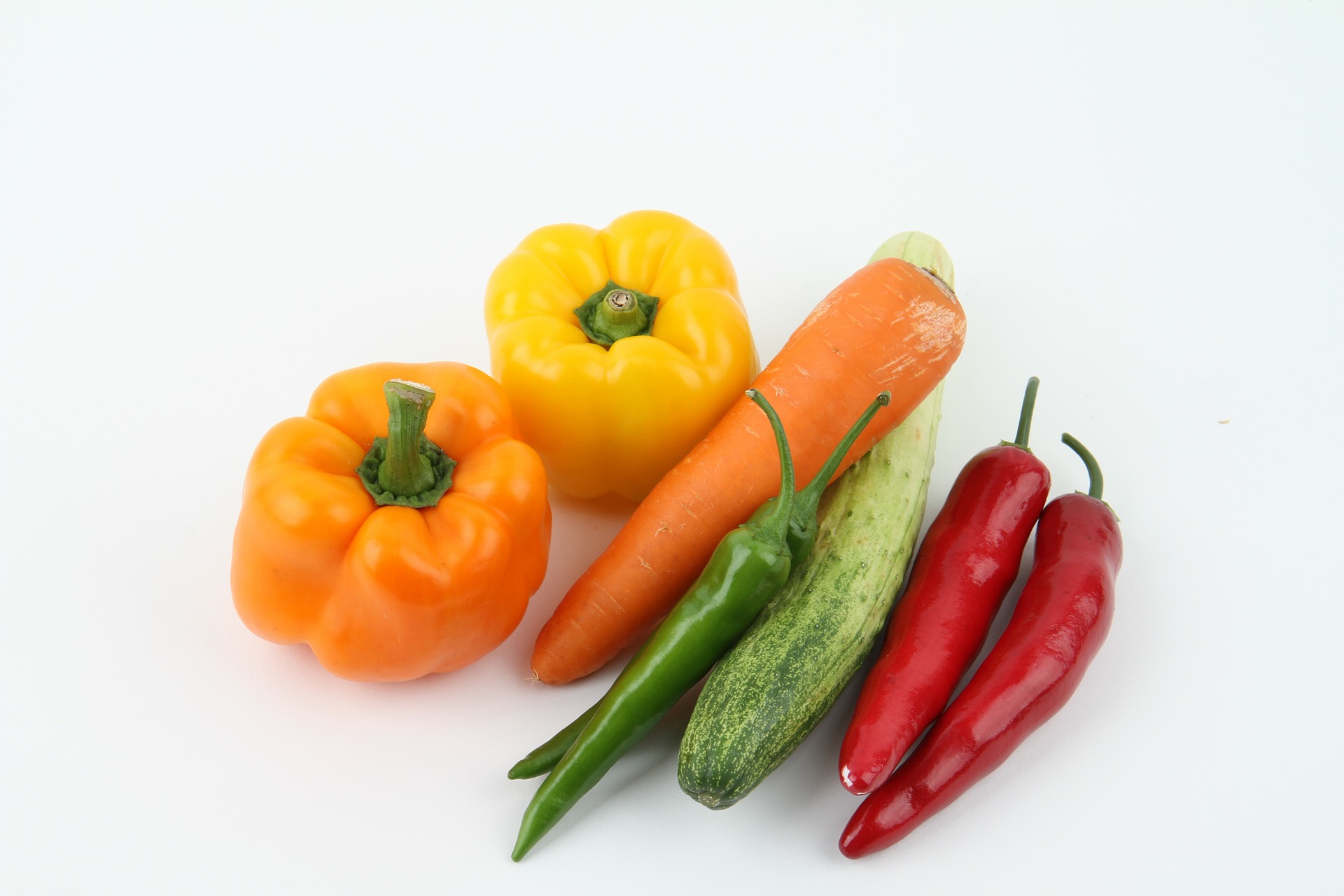 reduce energy density by adding vegetables - pictured capsicum, carrot, cucumber and chilli