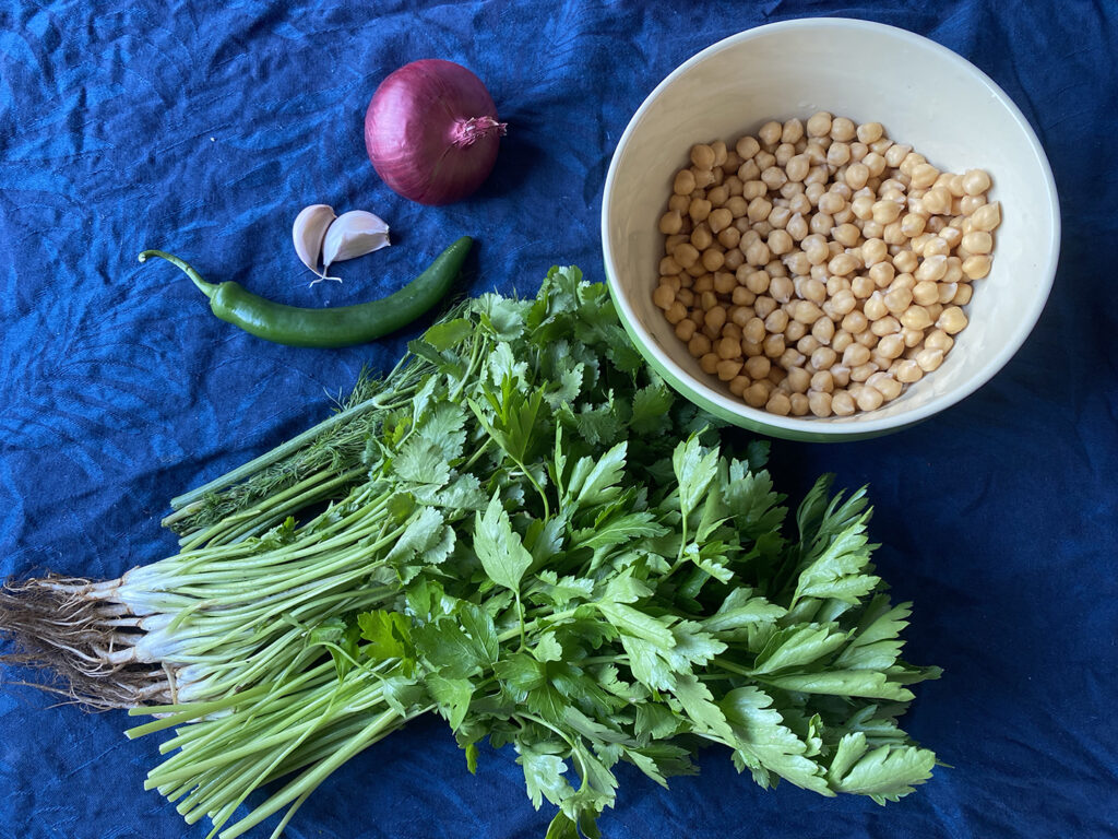 healthy baked falafel ingredients - dill, parsley, coriander, chilli, garlic, onion and chickpeas