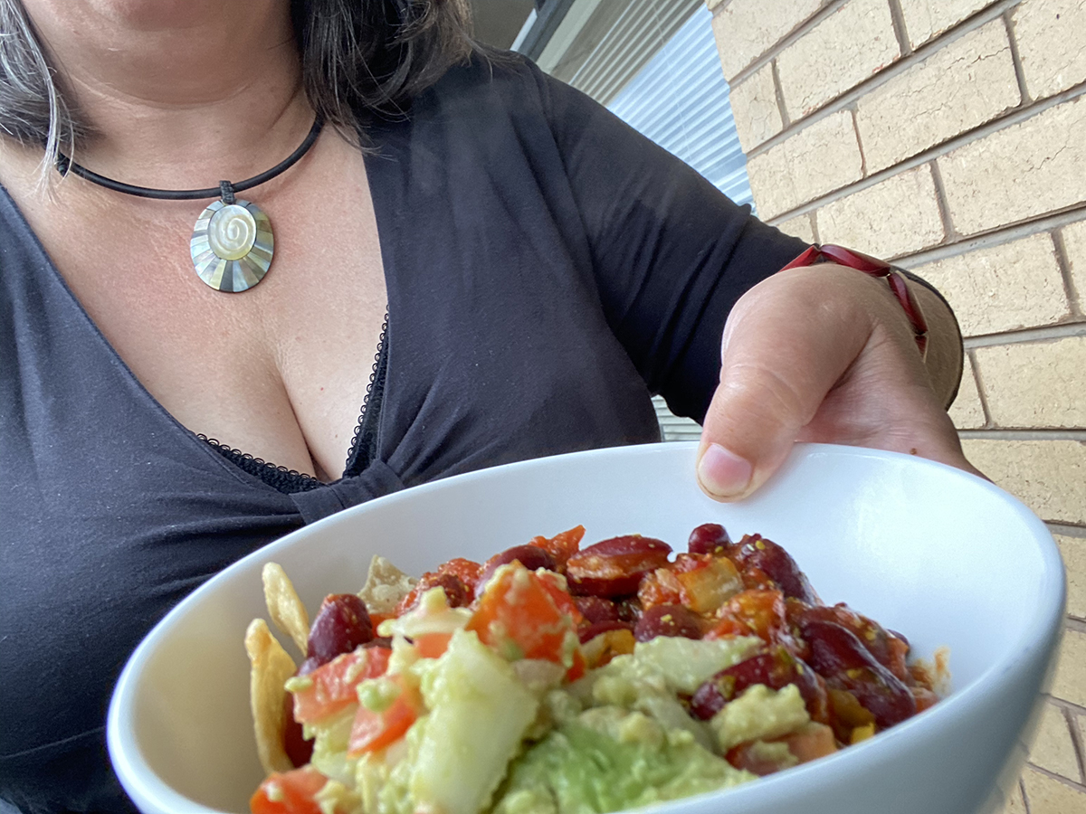 offering healthy bowl of beans, rice and veggies - how to stay motivated to eat healthy, motivation to eat healthy, healthy eating motivation