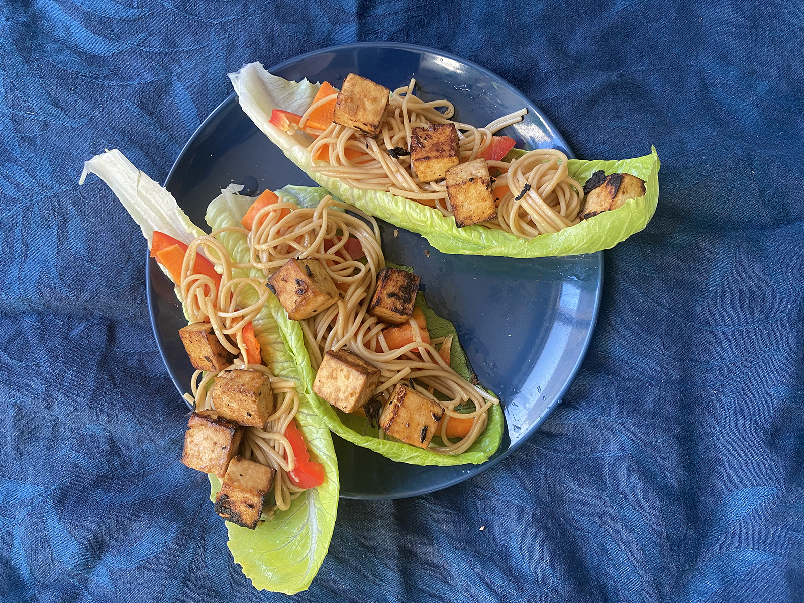 tofu lettuce wraps plated, vegan lettuce wraps that are light and delicious, a lettuce wraps recipe