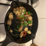 cooking mushrooms, sundried tomatoes and parsley