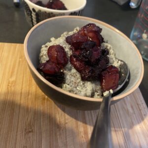 plated chia seed pudding and blueberry compote