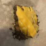 vegan american cheddar on a lentil burger patty