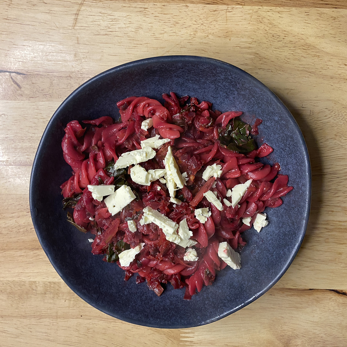 beetroot and feta pasta with silverbeet and vegan creme fraiche