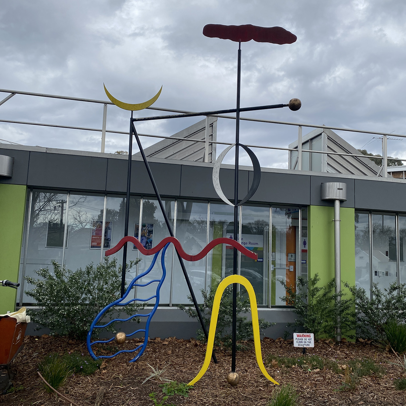 hustling - exercise accountability partner job - coloured metal sculpture outside city of yarra gym