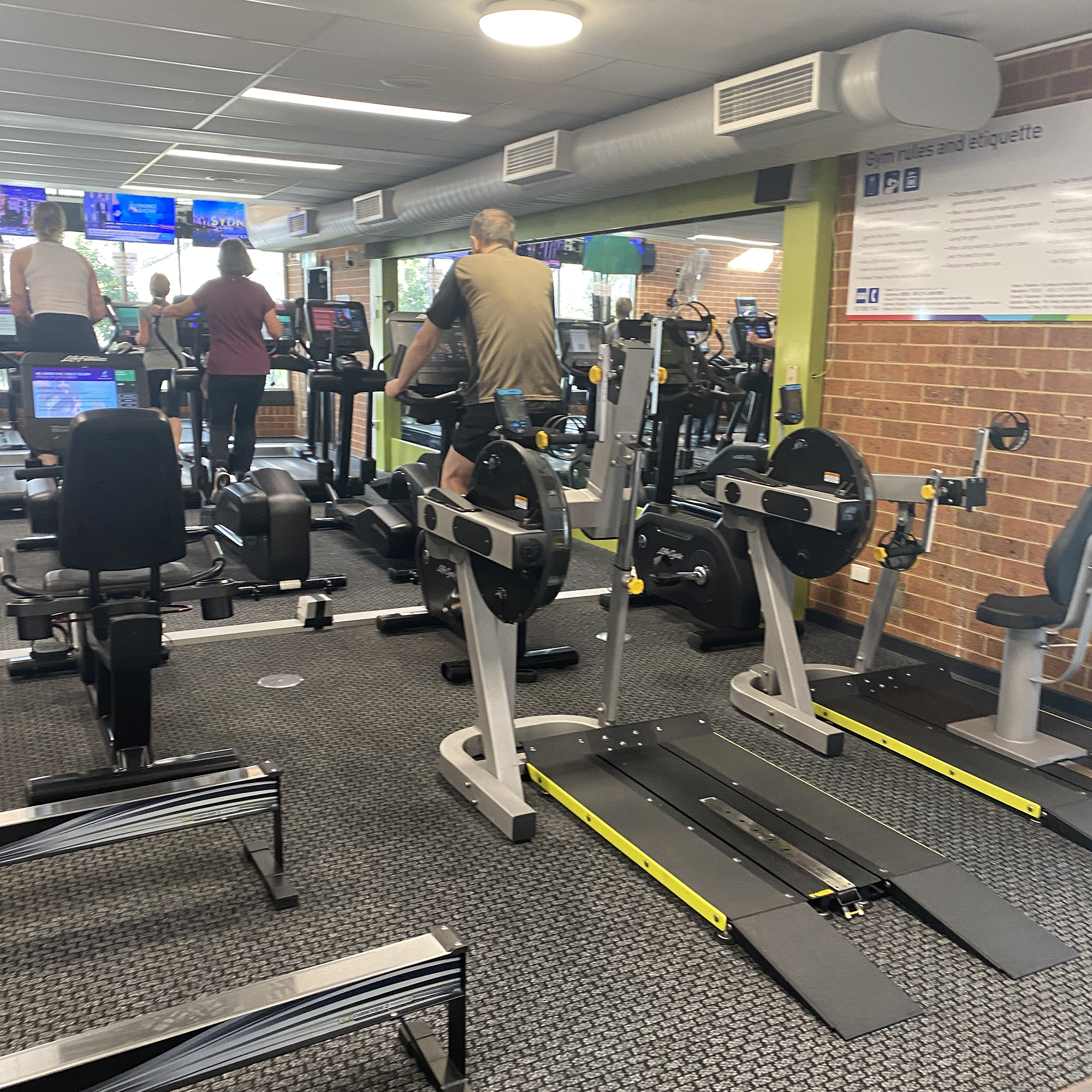 view of bikes and treadmills at collingwood leisure centre - keeping a fitness habit through a holiday exercise routine