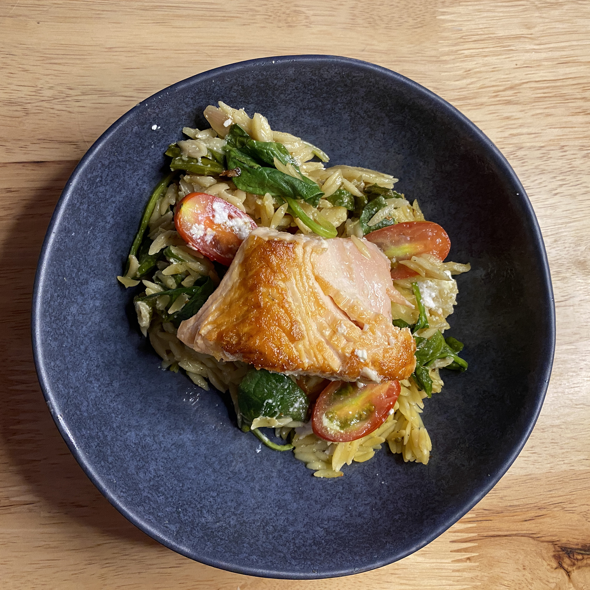 one pan salmon and orzo with cherry tomatoes, spinach and feta