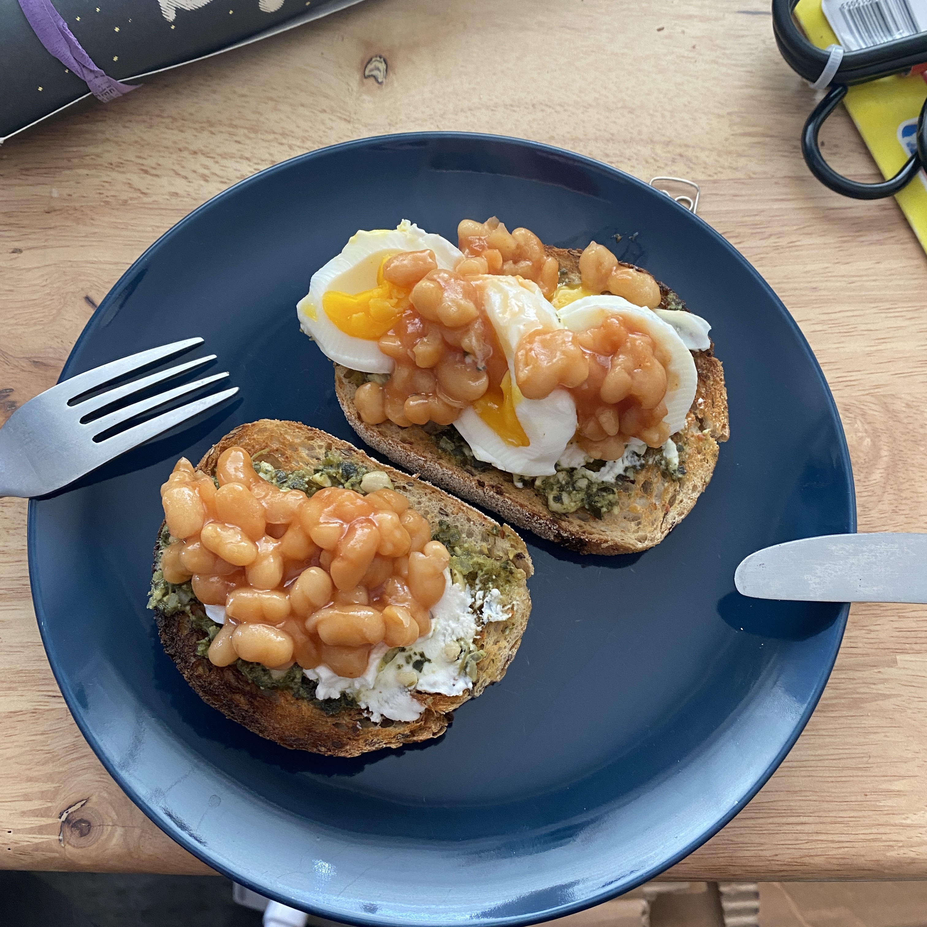 pesto vegetarian eggs with baked beans and goats cheese