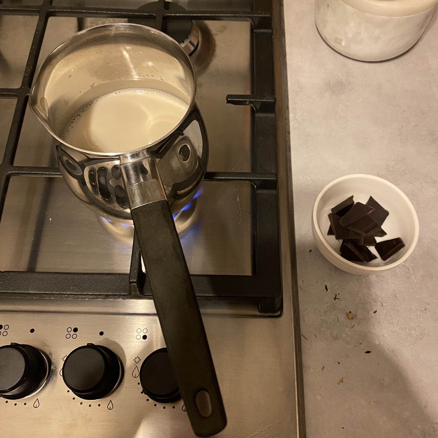milk simmering on the hob