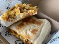 breakfast wrap sandwich - egg, chorizo, cheese, hashbrown in a tortilla
