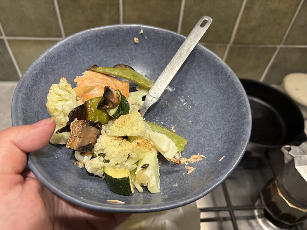 horseradish crusted salmon fillet (piece) with baked veggies on the side