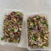 sunshine slaw with quinoa in take away containers for prep