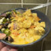 delicious yoghurt chicken curry with roasted vegetables